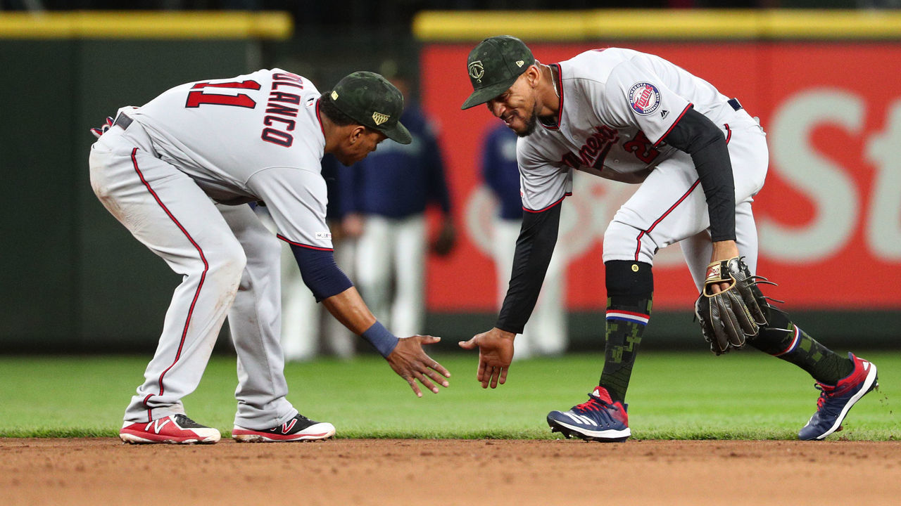 SEATTLE, WASHINGTON - MAY 17: Jorge Polanco #11 of the Minnesota Twins (L) and Byron Buxton #25 of the Minnesota Twins celebrate their 7-1 win against the Seattle Mariners during their game at T-Mobile Park on May 17, 2019 in Seattle, Washington.