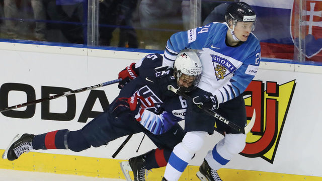 KOSICE, SLOVAKIA-MAY 13: Kaapo Kakko #24 of Finland and Jack Hughes #6 of USA clash along the boards during the 2019 IIHF Ice Hockey World Championship Slovakia group A game between United States and Finland at Steel Arena on May 13, 2019 in Kosice, Slovakia.
