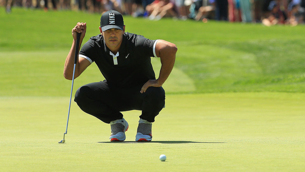 FARMINGDALE, NEW YORK - MAY 18: Brooks Koepka of the United States lines up a putt on the first green during the second round of the 2019 PGA Championship at the Bethpage Black course on May 18, 2019 in Farmingdale, New York.