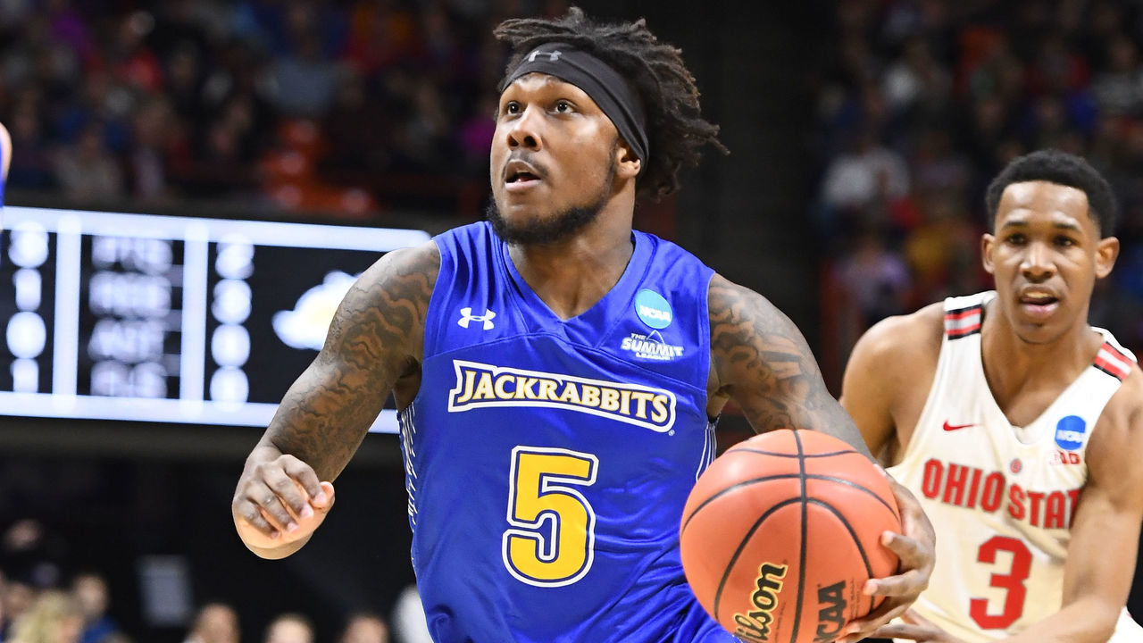 BOISE, ID - MARCH 15: David Jenkins Jr. #5 of the South Dakota State University drives the ball during the First Round of the 2018 NCAA Men's Basketball Tournament held at Taco Bell Arena on March 15, 2018 in Boise, Idaho.