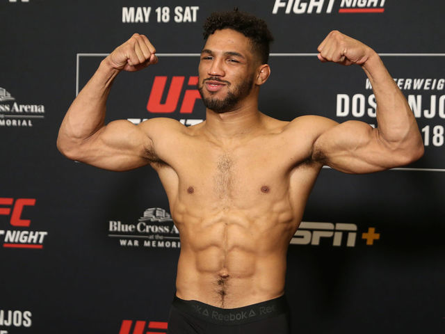 ROCHESTER, NY - MAY 17: Kevin Lee poses on the scale during the UFC Fight Night weigh-in at Rochester Riverside Hotel on May 17, 2019 in Rochester, New York.