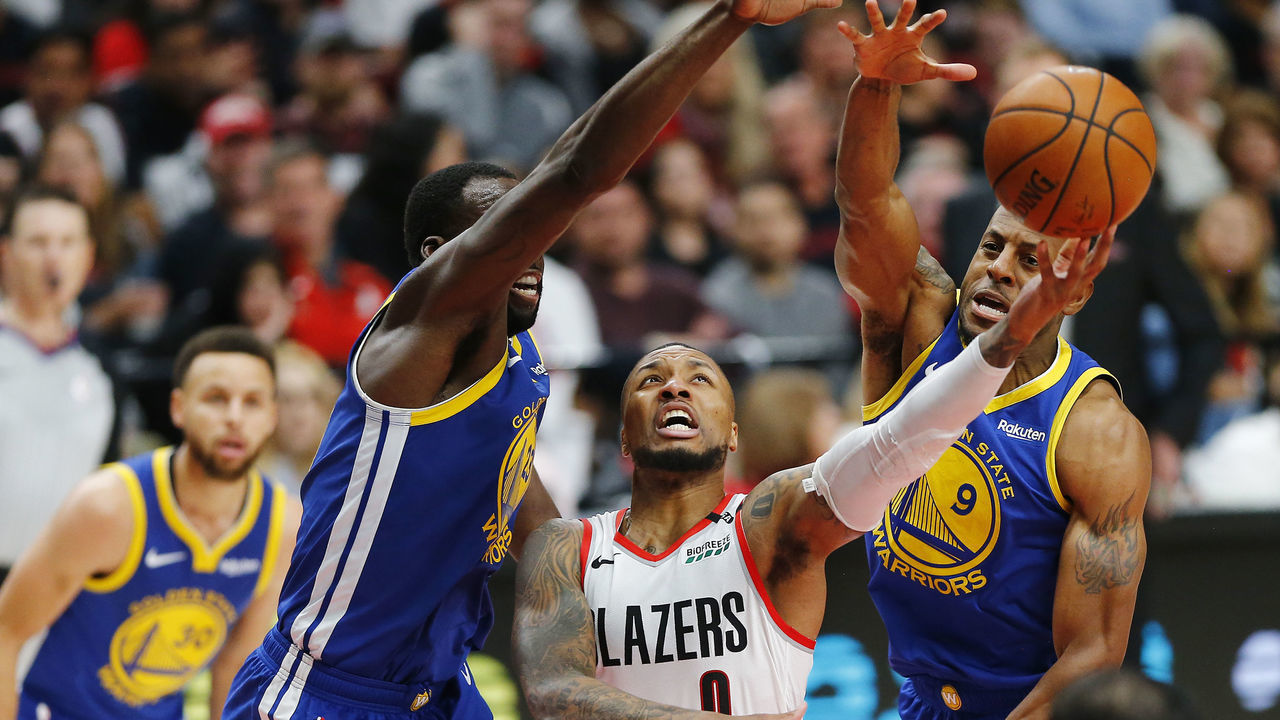 PORTLAND, OREGON - MAY 18: Damian Lillard #0 of the Portland Trail Blazers shoots the ball during the first half against the Golden State Warriors in game three of the NBA Western Conference Finals at Moda Center on May 18, 2019 in Portland, Oregon.