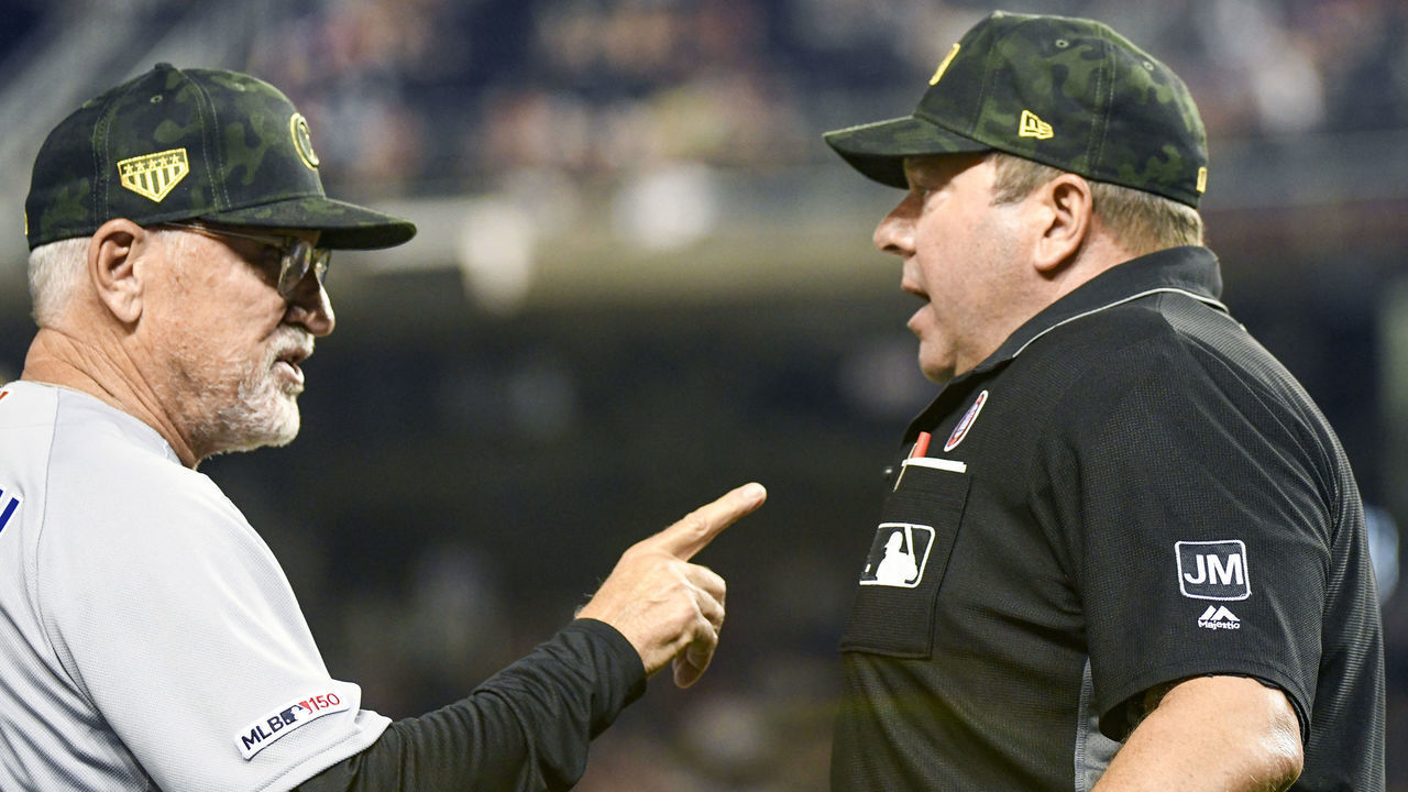 WASHINGTON, DC - MAY 18: Chicago Cubs manager Joe Maddon (70) has words with home plate umpire Sam Holbrook (34) in the ninth inning during the game between the Chicago Cubs and the Washington Nationals on May 18, 2019, at Nationals Park, in Washington D.C.