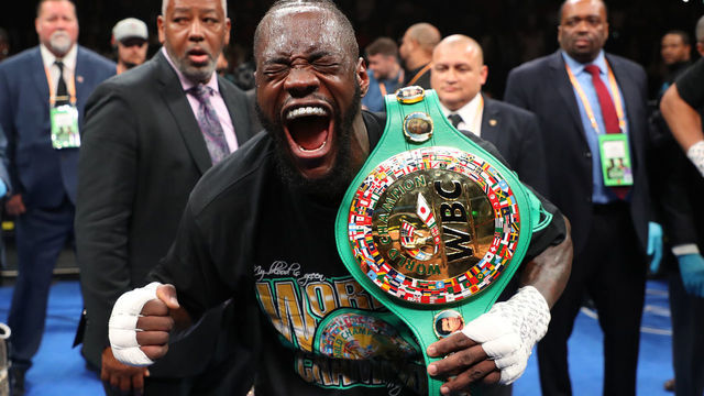 NEW YORK, NEW YORK - MAY 18: Deontay Wilder celebrates after knocking out Dominic Breazeale in the first round during their bout for Wilder's WBC heavyweight title at Barclays Center on May 18, 2019 in New York City.