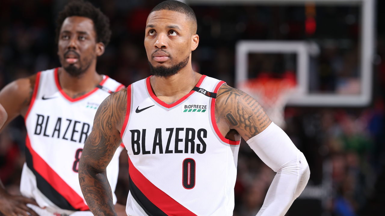 PORTLAND, OR - MAY 18: Damian Lillard #0 of the Portland Trail Blazers looks on during the game against the Golden State Warriors during Game Three of the Western Conference Finals of the 2019 NBA Playoffs on May 18, 2019 at the Moda Center in Portland, Oregon. Mandatory Copyright Notice: Copyright 2019 NBAE