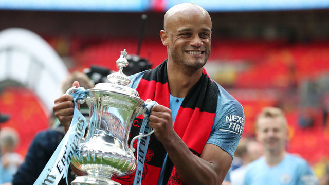 London, England 18th May Manchester City defender Vincent Kompany celebrates with the FA Cup during the FA Cup Final between Manchester City and Watford at Wembley Stadium, London on Saturday 18th May 2019.