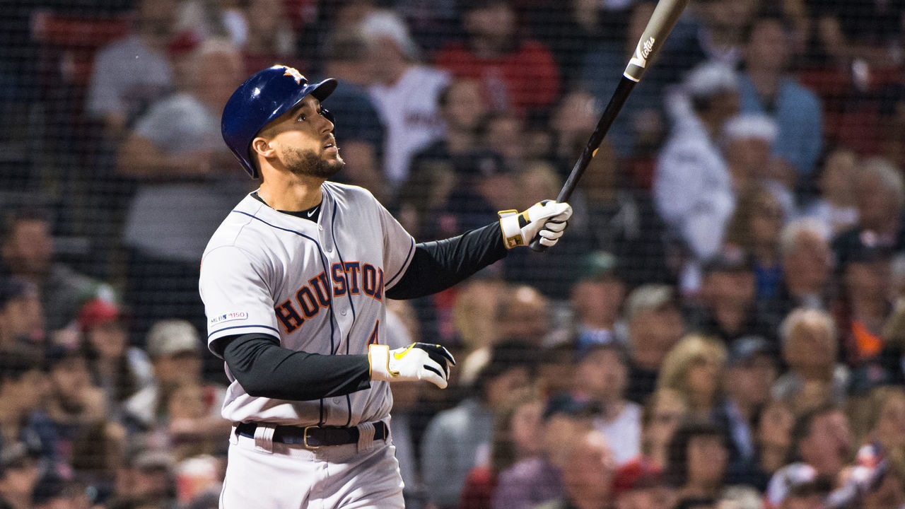 BOSTON, MA - MAY 17: George Springer #4 of the Houston Astros hits a two run home run in the eighth inning against the Boston Red Sox at Fenway Park on May 17, 2019 in Boston, Massachusetts.
