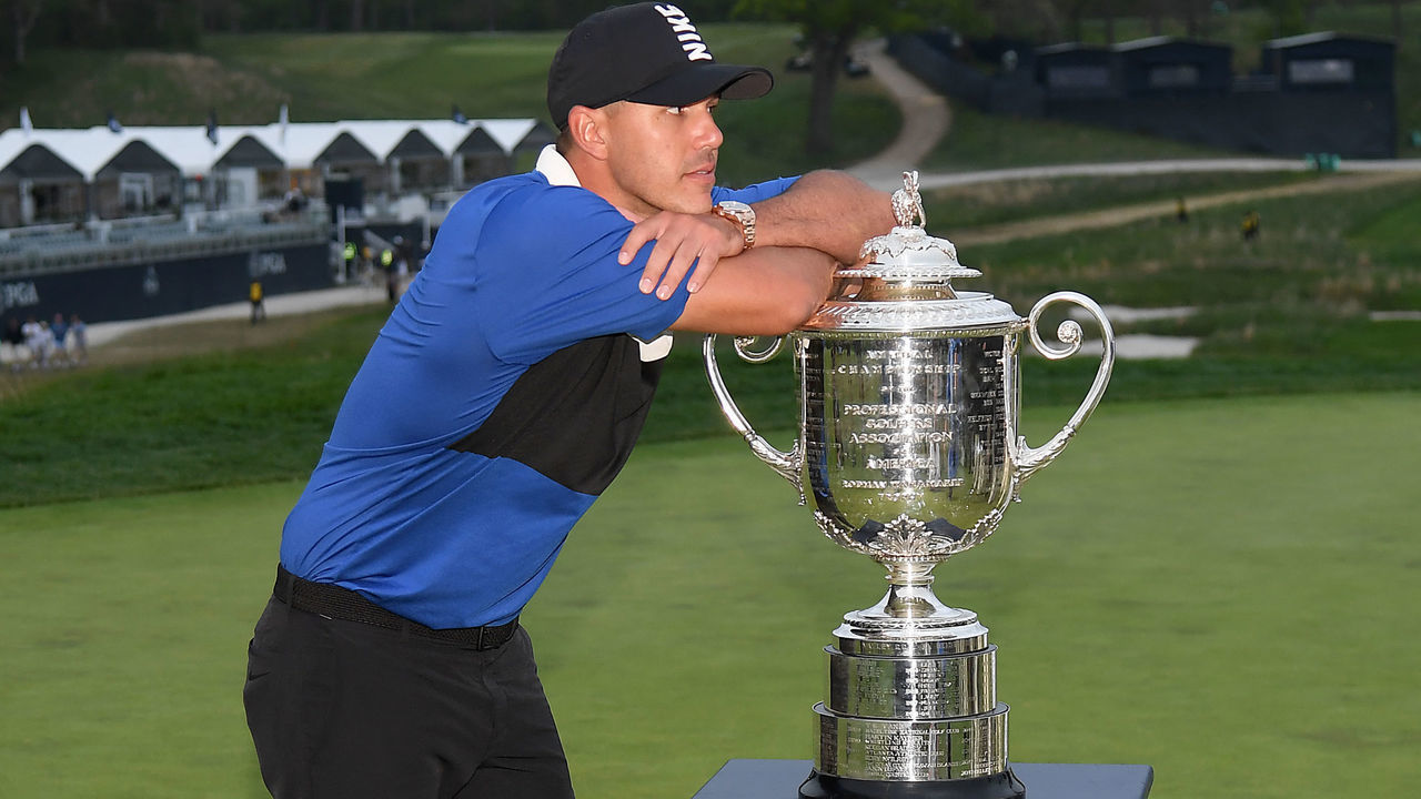 FARMINGDALE, NEW YORK - MAY 19: Brooks Koepka of the United States poses with the Wanamaker Trophy during the Trophy Presentation Ceremony after winning the final round of the 2019 PGA Championship at the Bethpage Black course on May 19, 2019 in Farmingdale, New York.