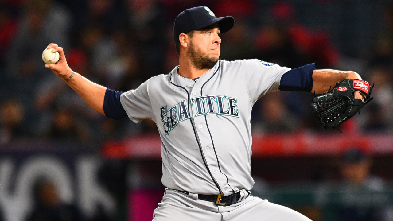 ANAHEIM, CA - APRIL 20: Seattle Mariners pitcher Anthony Swarzak (30) throws a pitch during a MLB game between the Seattle Mariners and the Los Angeles Angels of Anaheim on April 20, 2019 at Angel Stadium of Anaheim in Anaheim, CA.