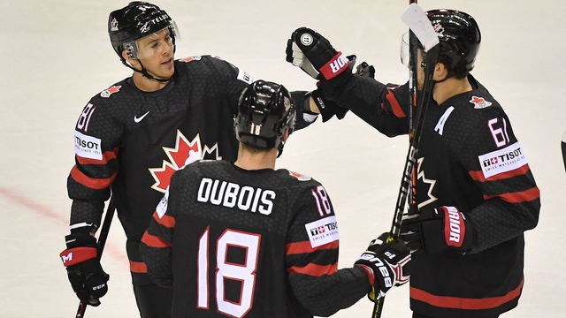 Canada's team players celebrate after scoring during the IIHF Men's Ice Hockey World Championships Group A match between Canada and Denmark on May 20, 2019 in Kosice, Slovakia.