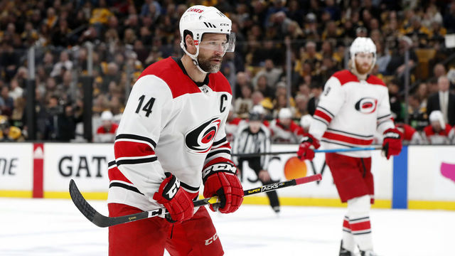 BOSTON, MA - MAY 12: Carolina Hurricanes right wing Justin Williams (14) moves in for the draw during Game 2 of the Stanley Cup Playoffs Eastern Conference Finals between the Boston Bruins and the Carolina Hurricanes on May 12, 2019, at TD Garden in Boston, Massachusetts.
