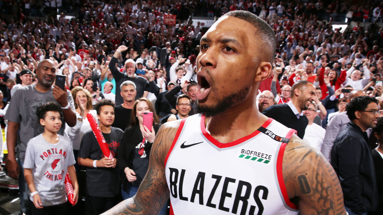PORTLAND, OR - APRIL 23: Damian Lillard #0 of the Portland Trail Blazers reacts to shooting a game-winning three point basket during Game Five of Round One of the 2019 NBA Playoffs against the Oklahoma City Thunder on April 23, 2019 at the Moda Center in Portland, Oregon. Mandatory Copyright Notice: Copyright 2019 NBAE