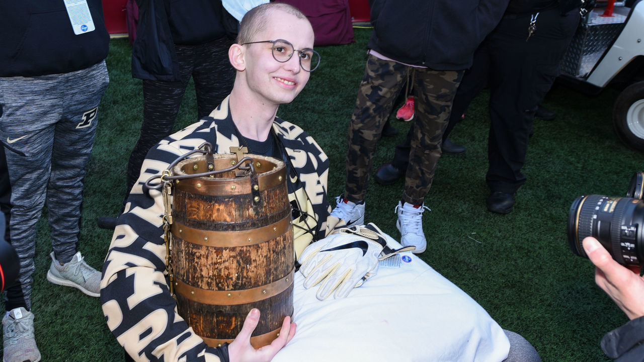 BLOOMINGTON, IN - NOVEMBER 24: Purdue honorary captain Tyler Trent with the Old Oaken Bucket following a college football game between the Purdue Boilermakers and Indiana Hoosiers on November 24, 2018, at Memorial Stadium in Bloomington, IN.
