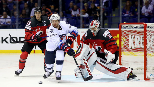 KOSICE, SLOVAKIA - MAY 21: Kyle Turris #19 of Canada challenges Luke Glendening #41 of United States during the 2019 IIHF Ice Hockey World Championship Slovakia group A game between Canada and United States at Steel Arena on May 21, 2019 in Kosice, Slovakia.