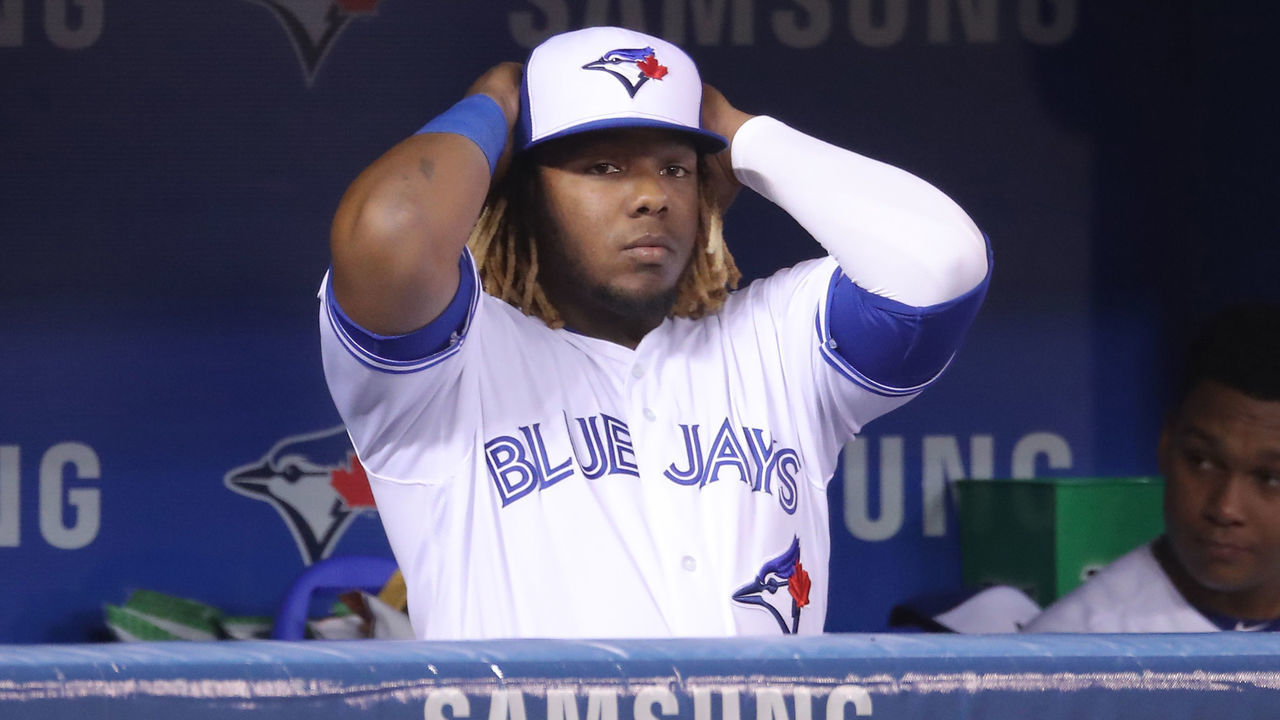 TORONTO, ON - MAY 20: Vladimir Guerrero Jr. #27 of the Toronto Blue Jays looks on from the dugout during MLB game action against the Boston Red Sox at Rogers Centre on May 20, 2019 in Toronto, Canada.