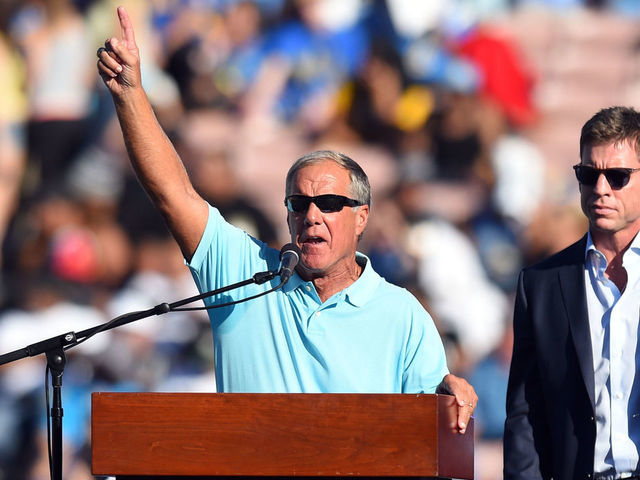 28 November 2014: Former UCLA football coach Terry Donahue introduces NFL Hall of Famer Troy Aikman during the ceremony to retire his #8 UCLA jersey during an NCAA football game between the Stanford Cardinal and the UCLA Bruins at the Rose Bowl in Pasadena, CA.