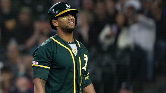 SEATTLE, WA - MAY 14: Khris Davis #2 of the Oakland Athletics reacts to striking out in the second inning against the Seattle Mariners at T-Mobile Park on May 14, 2019 in Seattle, Washington.