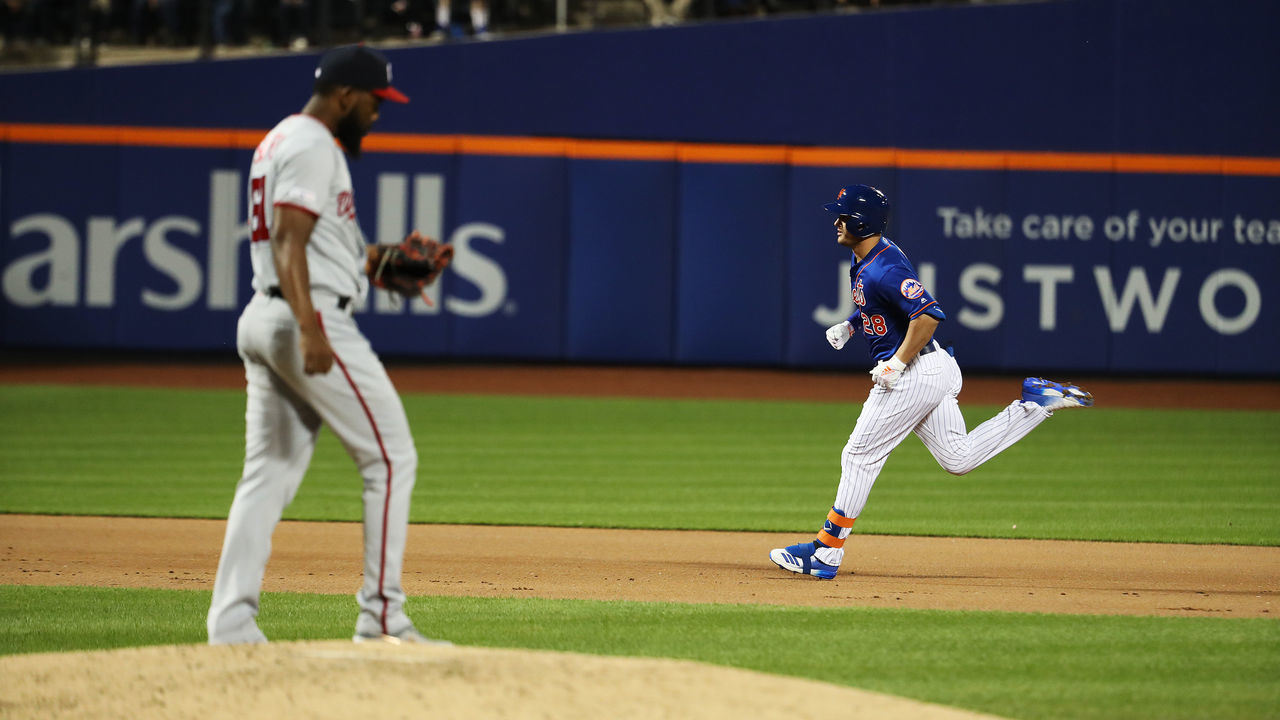 NEW YORK, NEW YORK - MAY 21: J.D. Davis #28 of the New York Mets rounds the bases after hitting an eighth inning three run home run against Wander Suero #51 of the Washington Nationals during their game at Citi Field on May 21, 2019 in New York City.