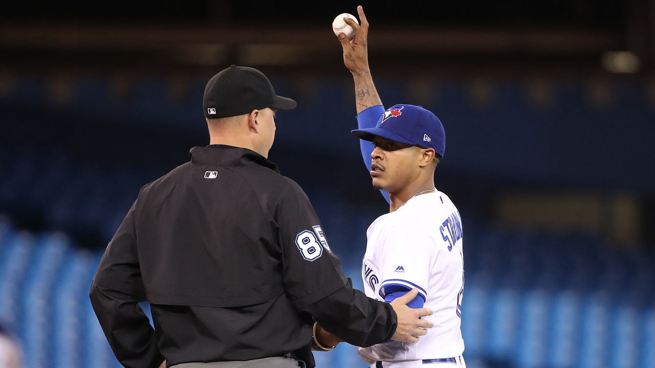 TORONTO, ON - MAY 21: Second base umpire Stu Scheurwater talks to #85 Marcus Stroman #6 of the Toronto Blue Jays in the fourth inning as he reacts to heckling from the Red Sox dugout by Michael Chavis #23 of the Boston Red Sox during MLB game action at Rogers Centre on May 21, 2019 in Toronto, Canada.