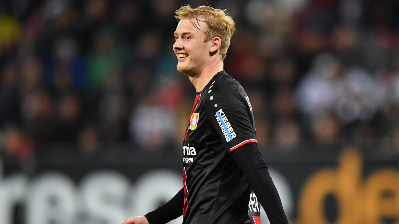 AUGSBURG, GERMANY - APRIL 26: Julian Brandt of Bayer 04 Leverkusen smiles in celebration as he scores his team's fourth goal during the Bundesliga match between FC Augsburg and Bayer 04 Leverkusen at WWK-Arena on April 26, 2019 in Augsburg, Germany.
