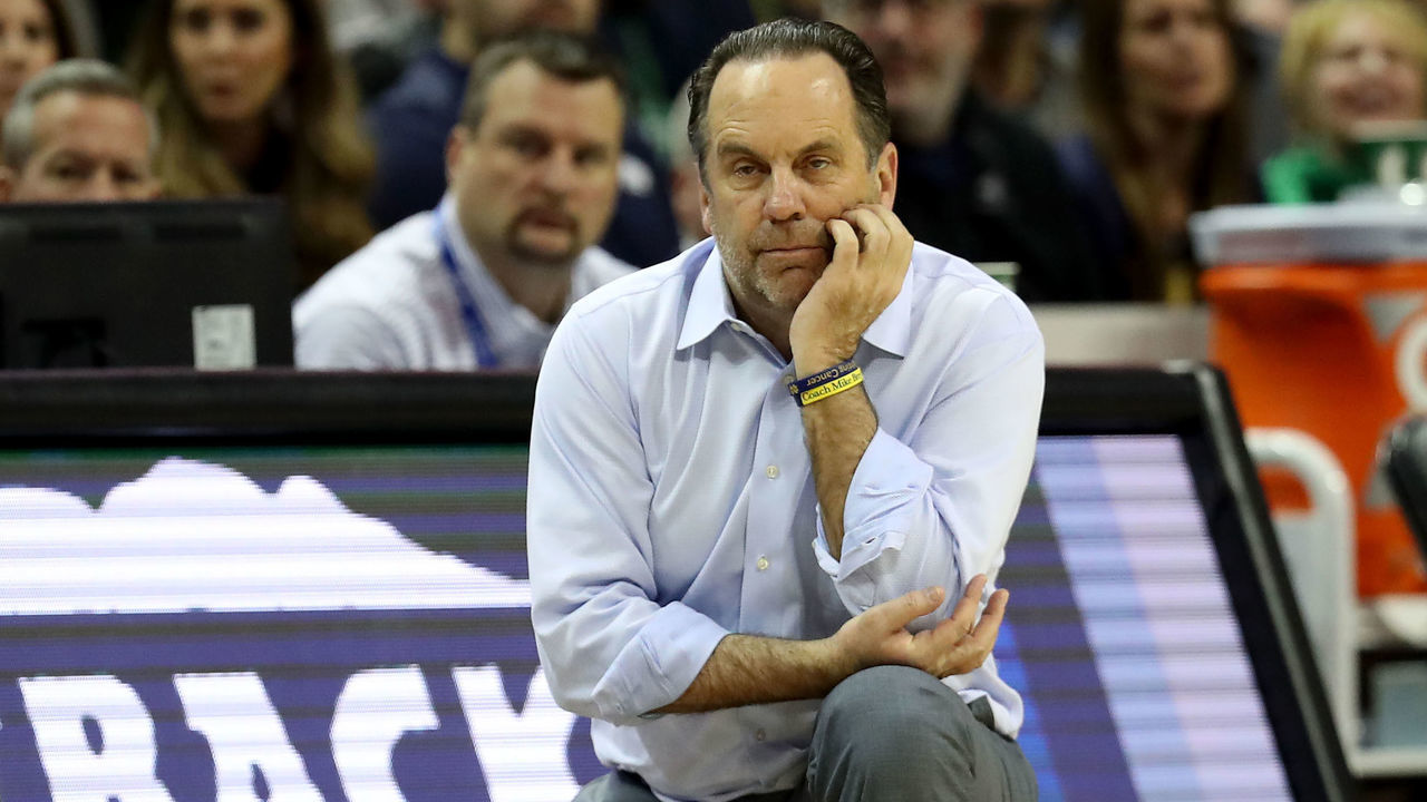 CHARLOTTE, NORTH CAROLINA - MARCH 13: Head coach Mike Brey of the Notre Dame Fighting Irish looks on against the Louisville Cardinals during their game in the second round of the 2019 Men's ACC Basketball Tournament at Spectrum Center on March 13, 2019 in Charlotte, North Carolina.