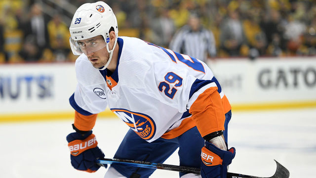 PITTSBURGH, PA - APRIL 14: Brock Nelson #29 of the New York Islanders prepares to take a faceoff during the first period in Game Three of the Eastern Conference First Round against the Pittsburgh Penguins during the 2019 NHL Stanley Cup Playoffs at PPG PAINTS Arena on April 14, 2019 in Pittsburgh, Pennsylvania.