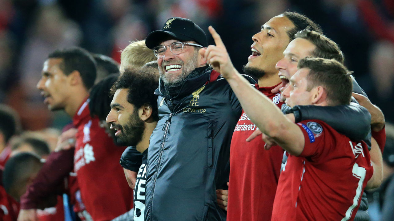 7th May 2019, Anfield, Liverpool, England; UEFA Champions League football, semi final second leg, Liverpool versus FC Barcelona; Liverpool manager Jurgen Klopp celebrates after the final whistle with Mohamed Salah of Liverpool and Virgil van Dijk of Liverpool in front of the Kop as they sing You'll Never Walk Alone