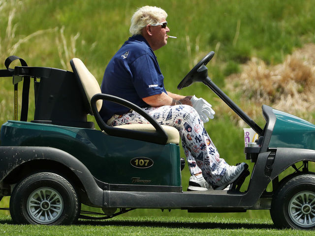 FARMINGDALE, NEW YORK - MAY 16: John Daly of the United States drives a cart on the 11th hole during the first round of the 2019 PGA Championship at the Bethpage Black course on May 16, 2019 in Farmingdale, New York.