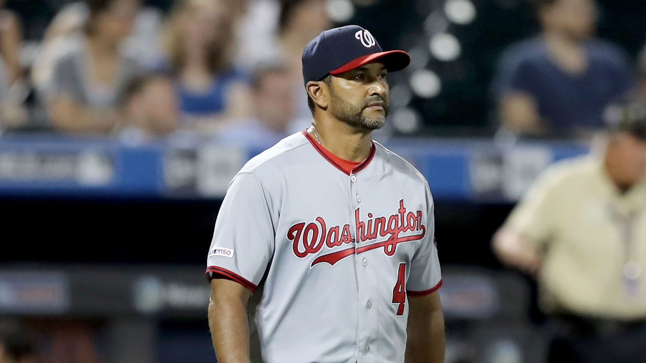 Manager Dave Martinez of the Washington Nationals makes a pitching News  Photo - Getty Images