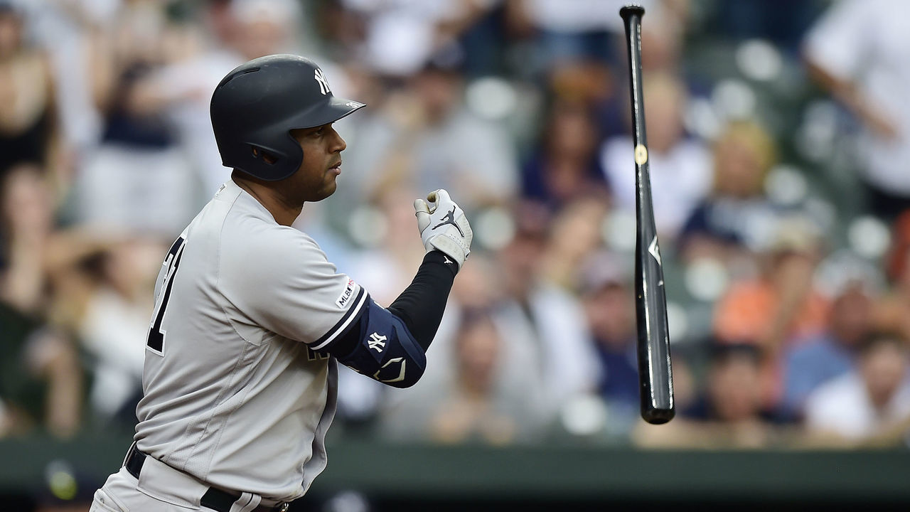 BALTIMORE, MD - MAY 23: Aaron Hicks #31 of the New York Yankees tosses his bat after being walked with the bases loaded scoring Gleyber Torres #25 (not pictured) in the ninth inning against the Baltimore Orioles at Oriole Park at Camden Yards on May 23, 2019 in Baltimore, Maryland.