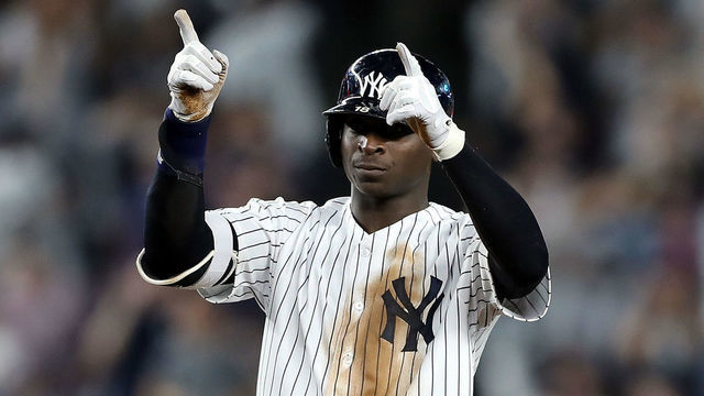 NEW YORK, NEW YORK - OCTOBER 09: Didi Gregorius #18 of the New York Yankees reacts after a double in the fourth inning against the Boston Red Sox during Game Four American League Division Series at Yankee Stadium on October 09, 2018 in the Bronx borough of New York City.