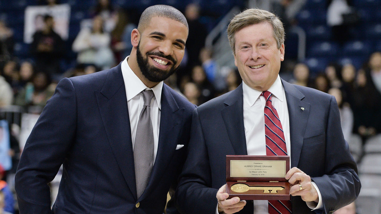 TORONTO, ON - FEBRUARY 12: Drake and Toronto Mayor John Tory attend the 2016 NBA All-Star Celebrity Game at Ricoh Coliseum on February 12, 2016 in Toronto, Canada.