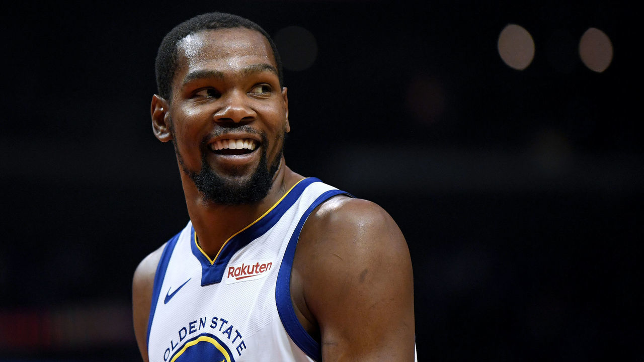 LOS ANGELES, CALIFORNIA - APRIL 26: Kevin Durant #35 of the Golden State Warriors smiles at his bench in a 129-110 win over the LA Clippers during Game Six of Round One of the 2019 NBA Playoffs at Staples Center on April 26, 2019 in Los Angeles, California.