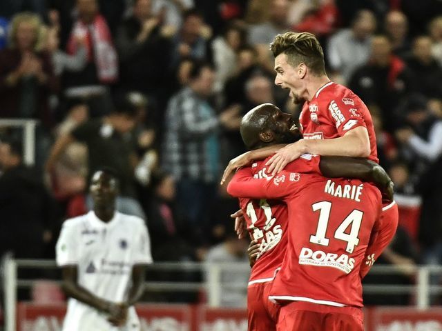 Dijon's Cap Verde forward Julio Tavares (L) celebrates after scoring a goal during the French L1 football match Dijon (DFCO) vs Toulouse (TFC) on May 24, 2019 in Gaston Gerard stadium in Dijon.