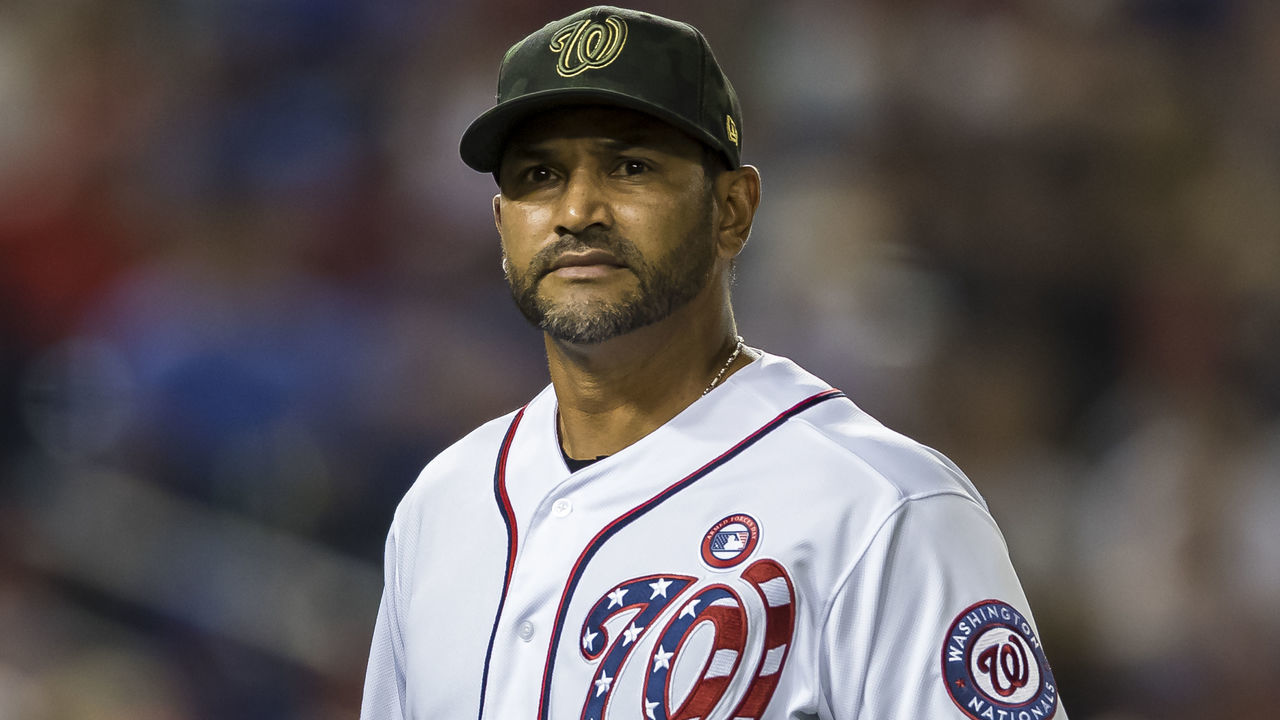 WASHINGTON, DC - MAY 18: Manager Dave Martinez #4 of the Washington Nationals looks on against the Chicago Cubs on during the ninth inning at Nationals Park on May 18, 2019 in Washington, DC.
