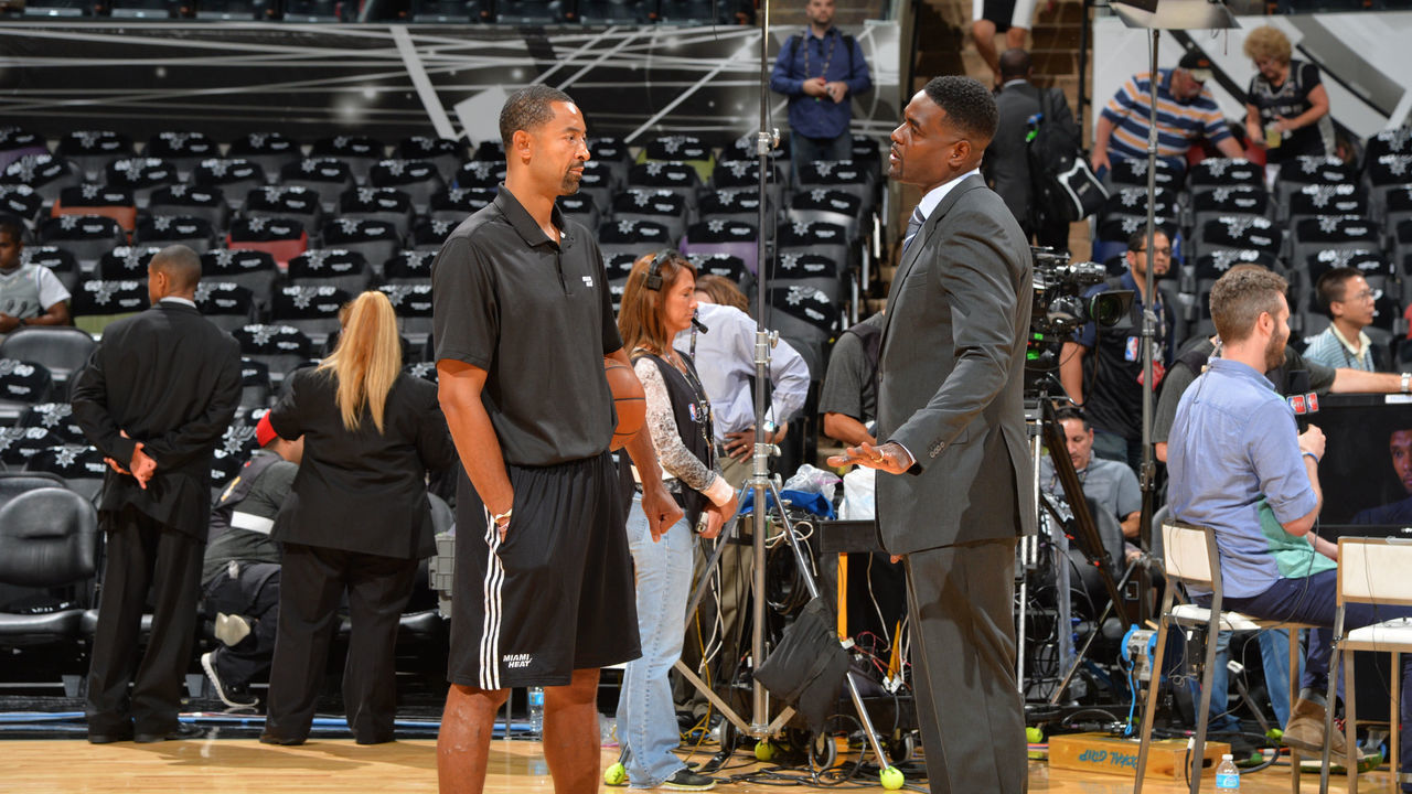 SAN ANTONIO, TX - JUNE 8: Chris Webber and Juwan Howard speak with eachother prior to Game Two of the 2014 NBA Finals on June 8, 2014 at AT&T Center in San Antonio, Texas. Mandatory Copyright Notice: Copyright 2014 NBAE