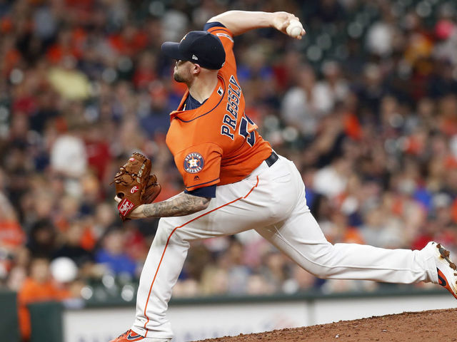 HOUSTON, TX - MAY 10: Ryan Pressly #55 of the Houston Astros pitches in the eighth inning against the Texas Rangers at Minute Maid Park on May 10, 2019 in Houston, Texas.
