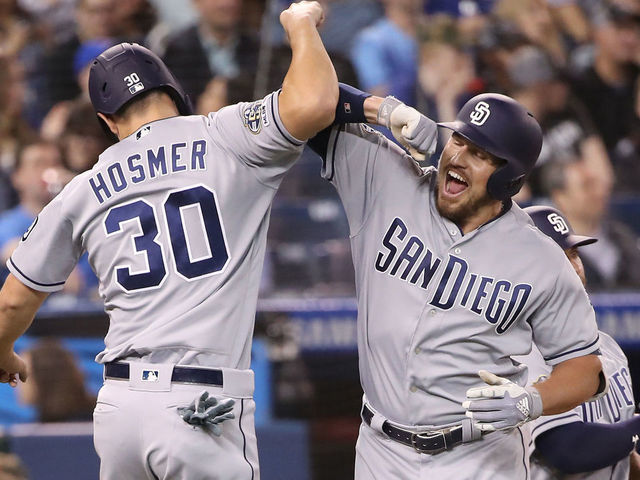 San Diego Padres' Eric Hosmer (30) celebrates his three-run home