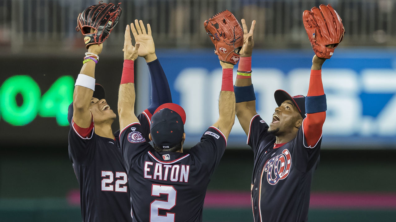 WASHINGTON, DC - MAY 24: Juan Soto #22 of the Washington Nationals celebrates with Adam Eaton #2 and Victor Robles #16 after the game against the Miami Marlins at Nationals Park on May 24, 2019 in Washington, DC.