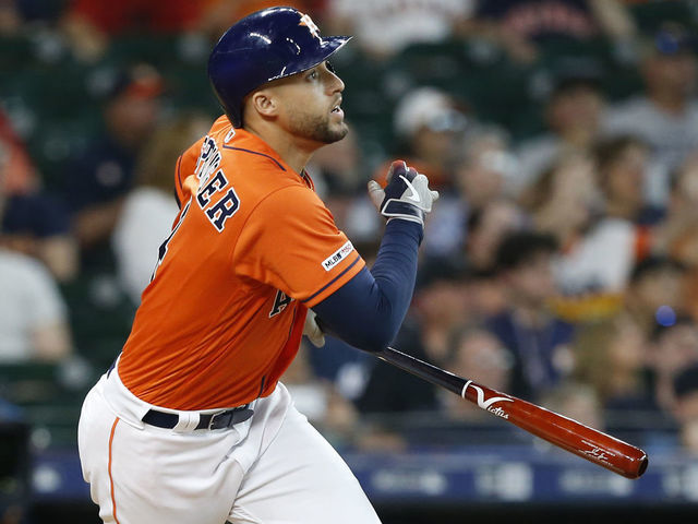 HOUSTON, TEXAS - MAY 24: George Springer #4 of the Houston Astros flies out to center field in the first inning against the Boston Red Sox at Minute Maid Park on May 24, 2019 in Houston, Texas.