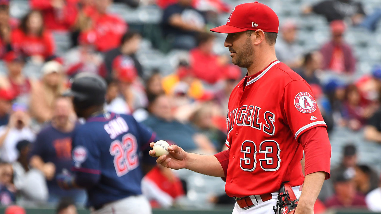 ANAHEIM, CA - MAY 23: Matt Harvey #33 of the Los Angeles Angels of Anaheim stands on the mound as Miguel Sano #22 of the Minnesota Twins rounds third on his solo home run in the third inning at Angel Stadium of Anaheim on May 23, 2019 in Anaheim, California.