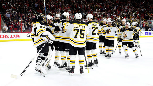 RALEIGH, NC - MAY 16: Tuukka Rask #40 of the Boston Bruins celebrates a victory with teammates in Game Four of the Eastern Conference Third Round against the Carolina Hurricanes during the 2019 NHL Stanley Cup Playoffs on May 16, 2019 at PNC Arena in Raleigh, North Carolina.