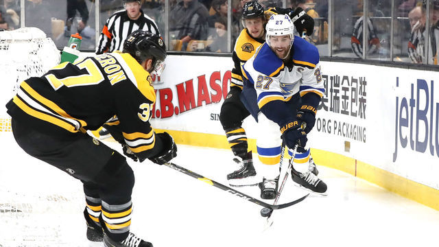 BOSTON, MA - JANUARY 17: Boston Bruins center Patrice Bergeron (37) moves in on St. Louis Blues defenseman Alex Pietrangelo (27) during a game between the Boston Bruins and the St. Louis Blues on January 17, 2019, at TD Garden in Boston, Massachusetts.