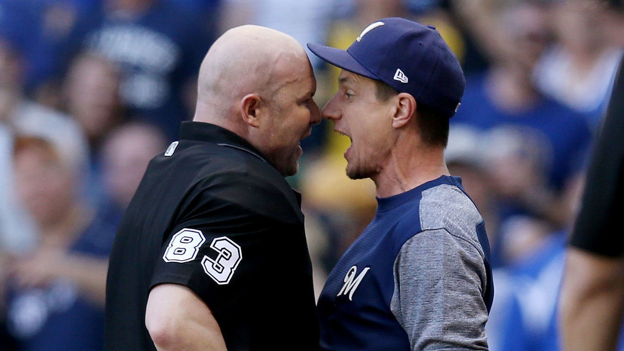 MILWAUKEE, WISCONSIN - MAY 25: Manager Craig Counsell of the Milwaukee Brewers argues with umpire Mike Estabrook in the eighth inning against the Philadelphia Phillies at Miller Park on May 25, 2019 in Milwaukee, Wisconsin.