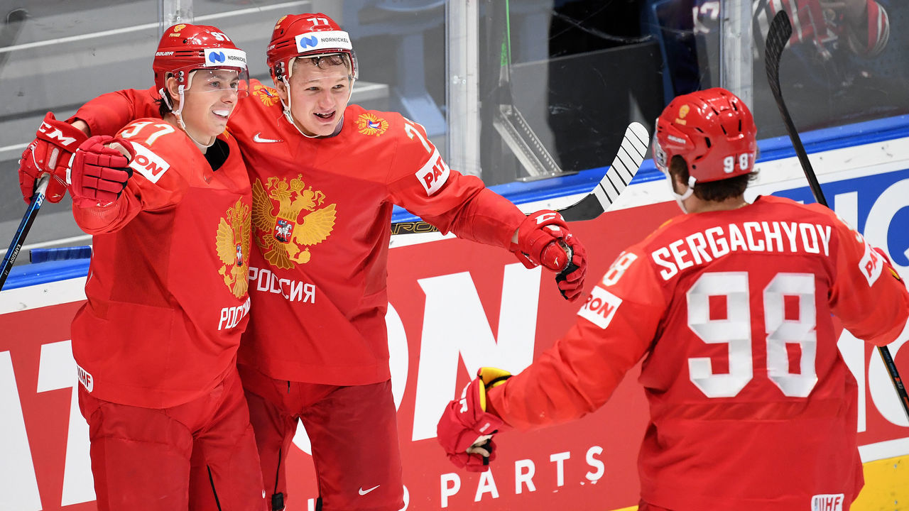 23 May 2019, Slovakia, Bratislava: Ice hockey: World Championship, Russia - USA, final round, quarter finals in Ondrej Nepela Arena. Russia's Nikita Gusev (l-r), Kirill Kaprisov and Mikhail Sergachev cheer for the goal to 3-1. Photo: Monika Skolimowska/dpa-Zentralbild/dpa