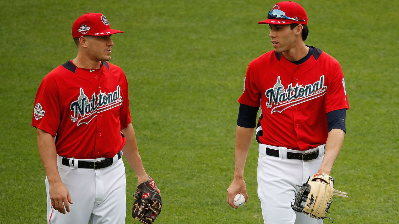 WASHINGTON, DC - JULY 17: J.T. Realmuto #11 of the Miami Marlins and the National League and Christian Yelich #22 of the Milwaukee Brewers and the National League warm up before the 89th MLB All-Star Game, presented by Mastercard at Nationals Park on July 17, 2018 in Washington, DC.