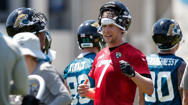 JACKSONVILLE, FL - MAY 21: Jacksonville Jaguars quarterback Nick Foles (7) talks with teammates during OTAs on May 21, 2019 at the Jaguars practice facility in Jacksonville, Fl.