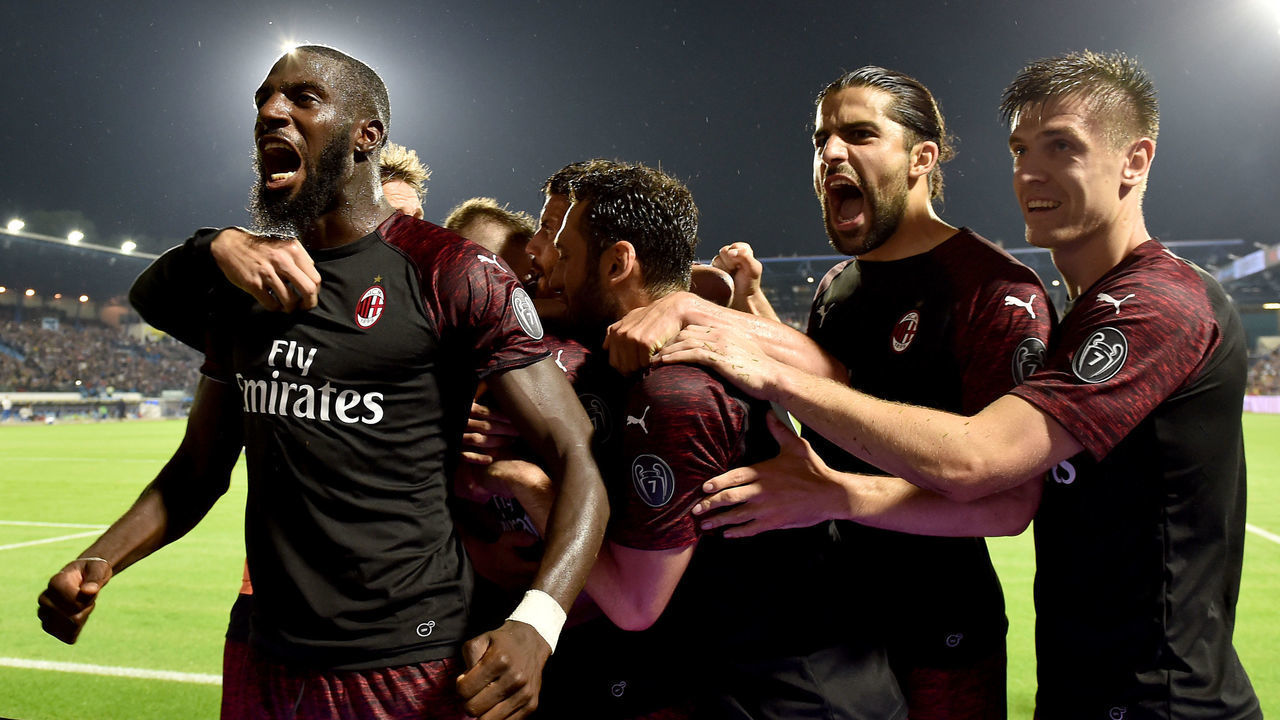FERRARA, ITALY - MAY 26: Franck Kessie of AC Milan celebrates with team mates after scoring his side third goal during the Serie A match between Spal and AC Milan at Stadio Paolo Mazza on May 26, 2019 in Ferrara, Italy.