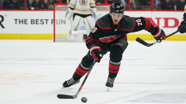 RALEIGH, NC - MAY 14: Carolina Hurricanes center Sebastian Aho (20) skates after a loose puck during a game between the Boston Bruins and the Carolina Hurricanes on May 14, 2019 at the PNC Arena in Raleigh, NC.