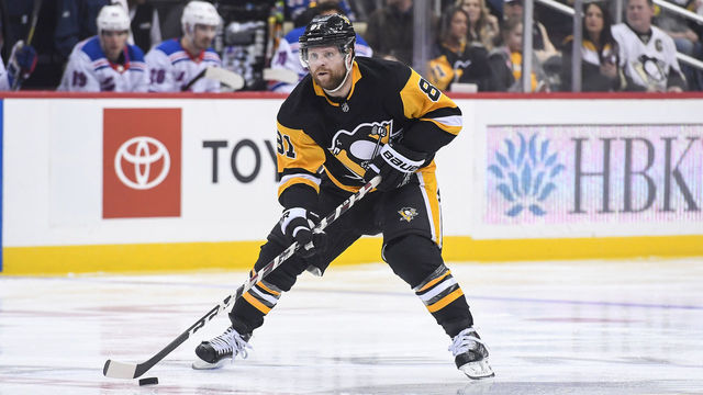 PITTSBURGH, PA - APRIL 06: Pittsburgh Penguins Right Wing Phil Kessel (81) carries the puck up ice during the second period in the NHL game between the Pittsburgh Penguins and the New York Rangers on April 6, 2019, at PPG Paints Arena in Pittsburgh, PA.